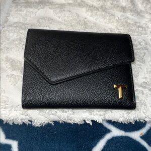 NWT and authentication card Tiffany tri-fold wallet